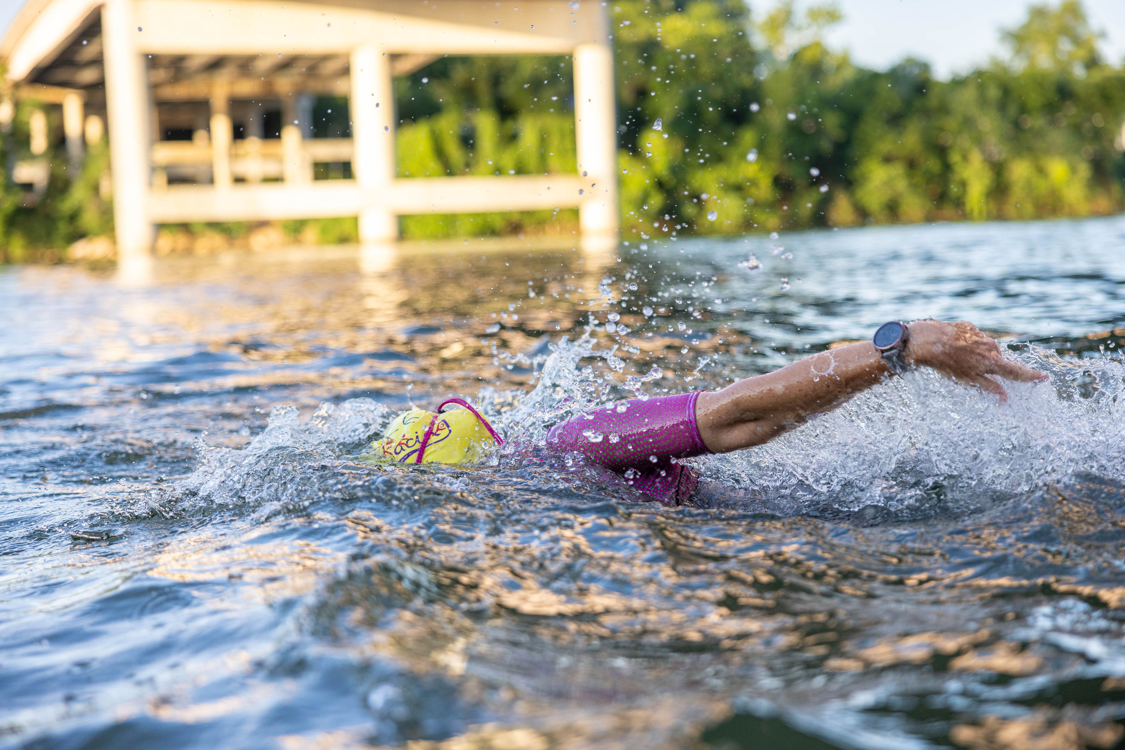 Coach Tracy swimming at 2026 TriStar